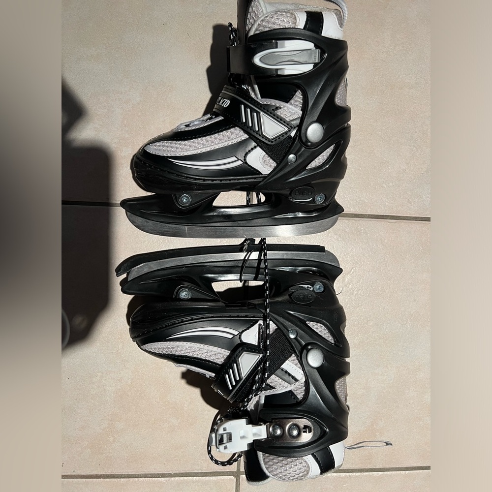 Lake Placid, adjustable toddler ice skates, sizes 10-13J. Worn about 6 times